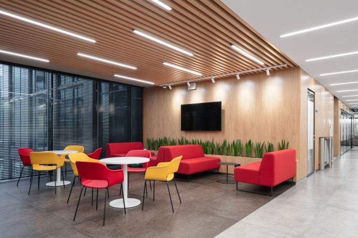Lounge area with wall-mounted display, Shell Office